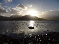 (13) Beinn Damh with a brief spell of sunshine between squalls, seen from the north shore of the Upper Loch. December.