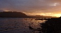 (22) September sunset from Lochside Cottage, on the north shore of the Loch, looking towards Ben Shieldaig (left), the Narrows and the north end of the Applecross peninsula.