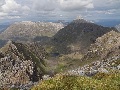 (31) Returning to Torridon's highest and most precipitous hill - Liathach: Coire na Caime, from the summit of Mullach an Rathain, with Beinn Eighe beyond.  July.