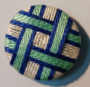 Thread wrapped buttons