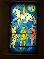 
	Another window, presumably based on the Pictish horserider carved
	on the stone outside
	