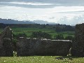 
	The recumbent stone circle at Tomnaverie (also ~2,500 B.C.):
	Lochnagar is
	directly behind the recumbent stone when viewed, as here, from the
	centre of the stone circle
	
