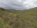
	Above the falls the terrain flattens:  this is looking up to the foot
	of the Coire a Cheud Chnoc
	
