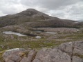 
	The Lochans Uaine, from a little way up Beinn Liath Mhor,
	backed by Sgorr an Lochan Uaine
	