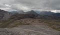 
	More of the Coulin forest appearing:  the bealach between Coire Lair
	and Coire Granda, Meall Chean Dearg (centre) with An Ruadh Stac
	to its left.  The lochan just disappearing behind the (near) ridge
	of Sgorr Ruadh is Loch a'Mhuilinn just behind the small part of 
	Meall nan Ceapairean that's visible.
	