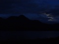 
	Moonlight at the end of our walk.  The shadowy
	hill across the loch is Beinn Damph.
	