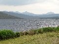 
	The eastern Coulins from further down Strath Bran, across
	Loch A'Chroisg:  (Beinn Liath Mhor is still second and third rises
	from the left)
	