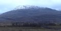 Waterfalls streaking the steep north flanks of Beinn na h'Eaglaise, viewed from the road towards the Youth Hostel
