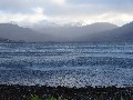 Spray whipped up from the surface of the loch