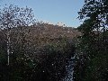 Early sun on Beinn Alligin's Tom na Gruagaich, seen from the road bridge at the Coire Mhic Nòbuill car park