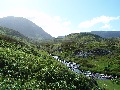 Cnoc nan Uamh, with its caves, behind the River Traligill
		before it disappears underground.  Breabag Tarsuinn is on the
		right (skyline)