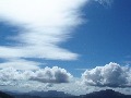 A big sky:  orographic cloud matching the massifs of
		Canisp (right) and Coigach (centre-left)