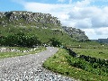Looking south from Inchnadamph:  limestone cliffs
		on left, glacial moraines on right